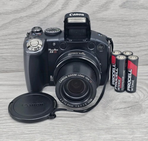 Canon powershot is - canon,